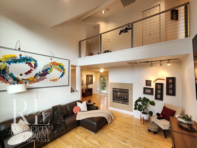 Building Photo - Light-Filled View Home with Vaulted Ceilings & Warm Wood Finishes