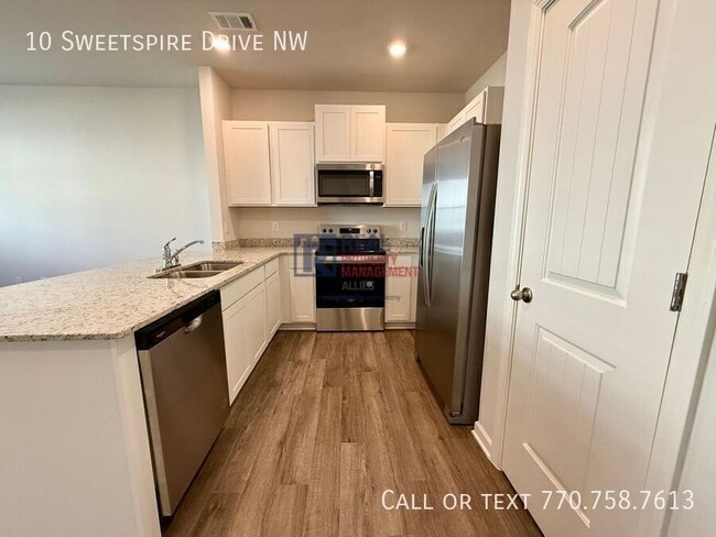 Building Photo - 10 Sweetspire Dr NW