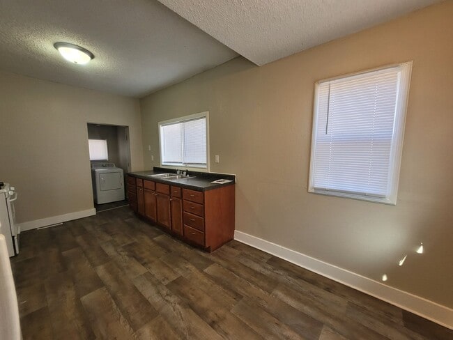 Building Photo - Two bedroom home with partially fenced yard!