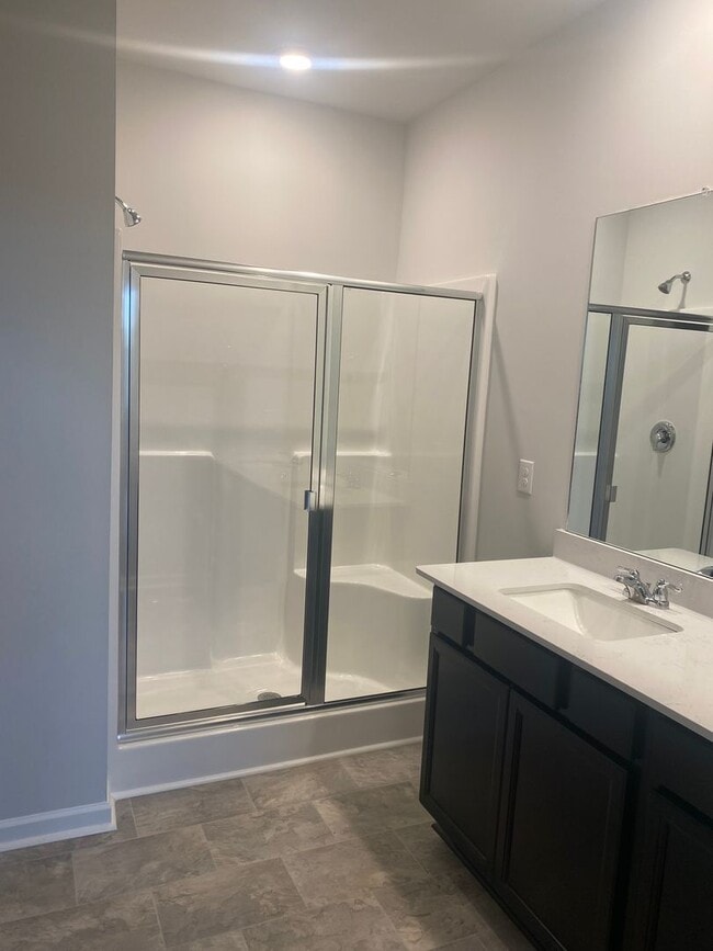 Building Photo - Brand New Construction - 4 bedroom 2 full ...