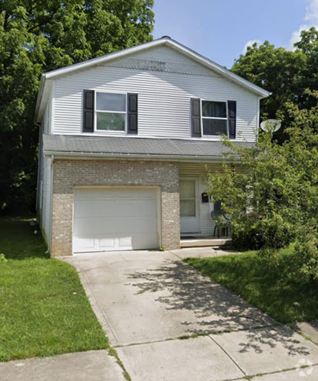 Building Photo - For Rent: Four-Bedroom, Two-Bathroom Avail...