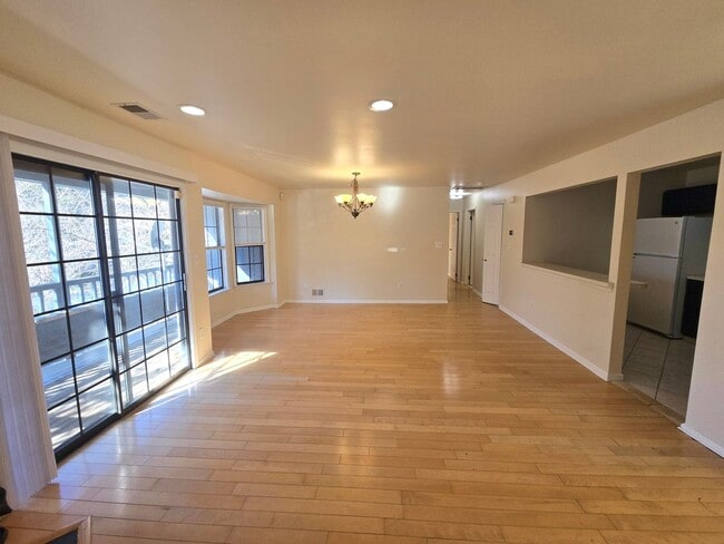 Building Photo - Commuter's delight! Spacious 2nd fl: 2-bed, 2-bath condo with fireplace, washer & dryer & off-str...