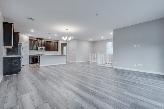 Building Photo - Like new, split-level, 3 bed, 2.5 bath, with bonus room & Strip views in West Las Vegas!