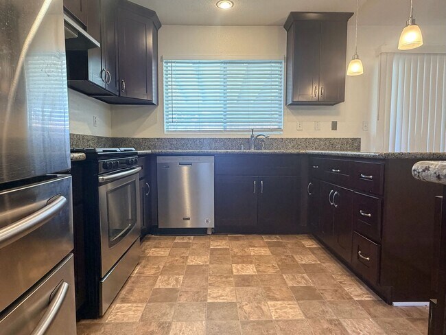 Building Photo - Move-In Ready Rosamond 3BR/2BA Home w/ Landscaping + Garage + Upgrades!