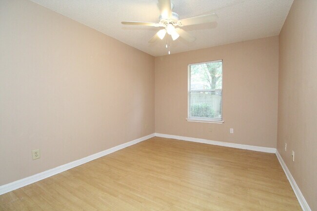 Building Photo - 2BR Home with Wood-Look Flooring, Fenced Backyard & Private Patio