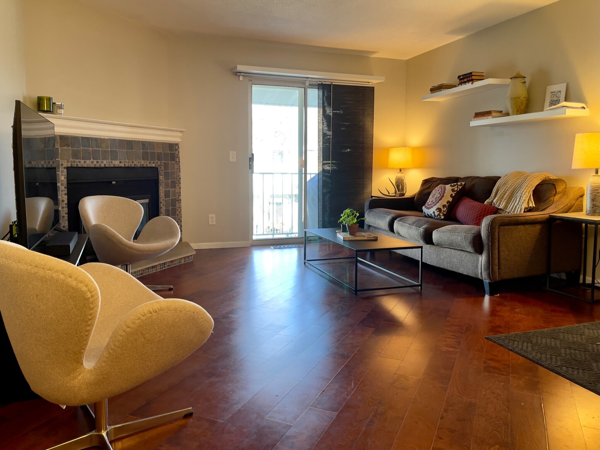 Living area has a balcony and a wood burning fire place! - 2262 Benson Ave