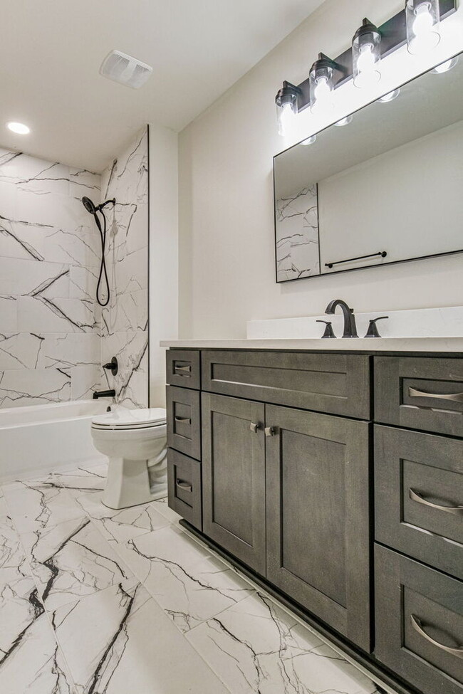 Building Photo - This luxurious new custom home in the sought-after Shadow Grove subdivision is a masterpiece of m...