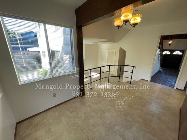 Building Photo - Beautiful 4-bed 2-bath Home with Cozy Fireplace, Front and Back Yards and Large Windows!