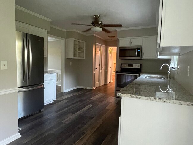 kitchen with stainless steel appliances - 1221 Settlebench Ln NW