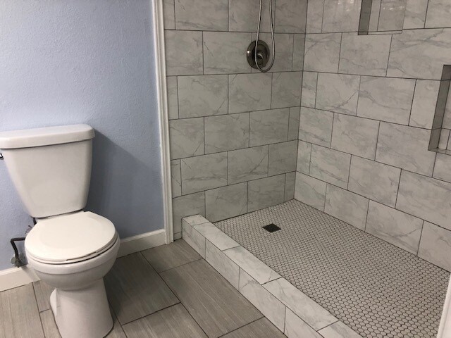 Marble tile shower - 2450 Wickersham Ln