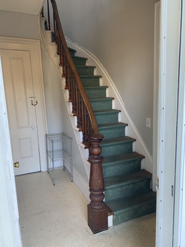 Stairs to the upstairs apartment - 1504 Ridge Rd