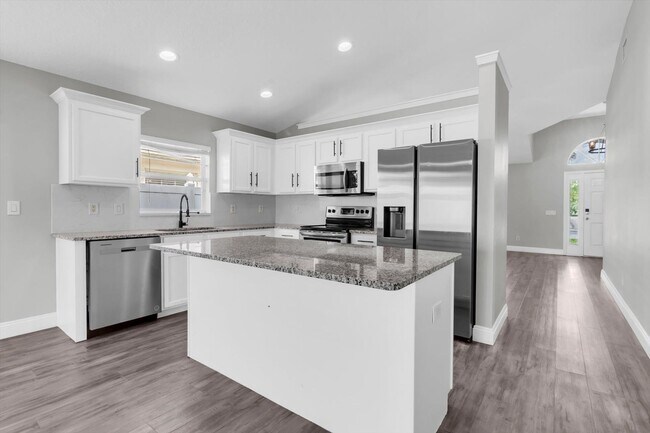 Building Photo - Spacious Renovated 4-Bedroom Home in Land O’ Lakes Near Veterans Expressway