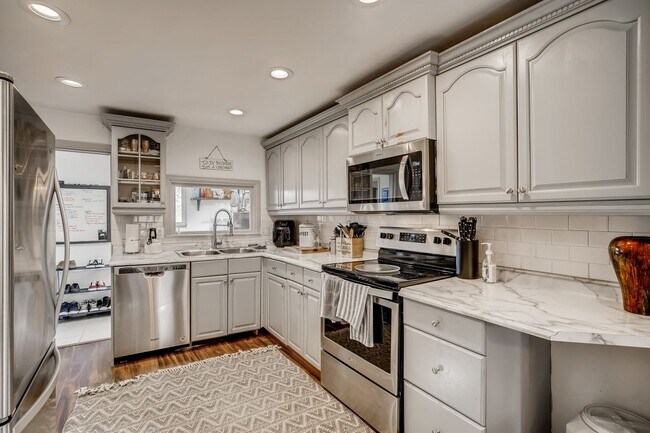 Building Photo - Updated Edgewater Home with Backyard Oasis