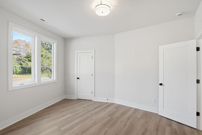 Building Photo - Bright, Open & Exceptionally Large—Your Ideal 2-Story Townhome