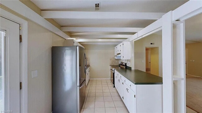 Building Photo - Earn Wealth While Leasing - Like a Homeown...