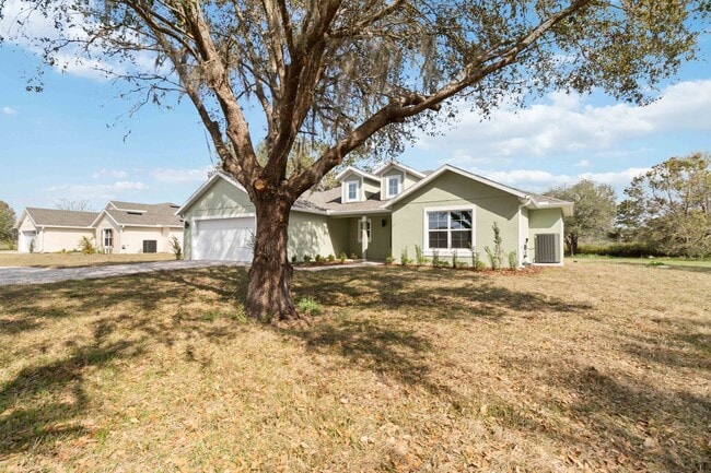 Building Photo - MOVE IN SPECIAL- Beautiful 4/2 Home on 3/4 Acre For Rent in St. Cloud