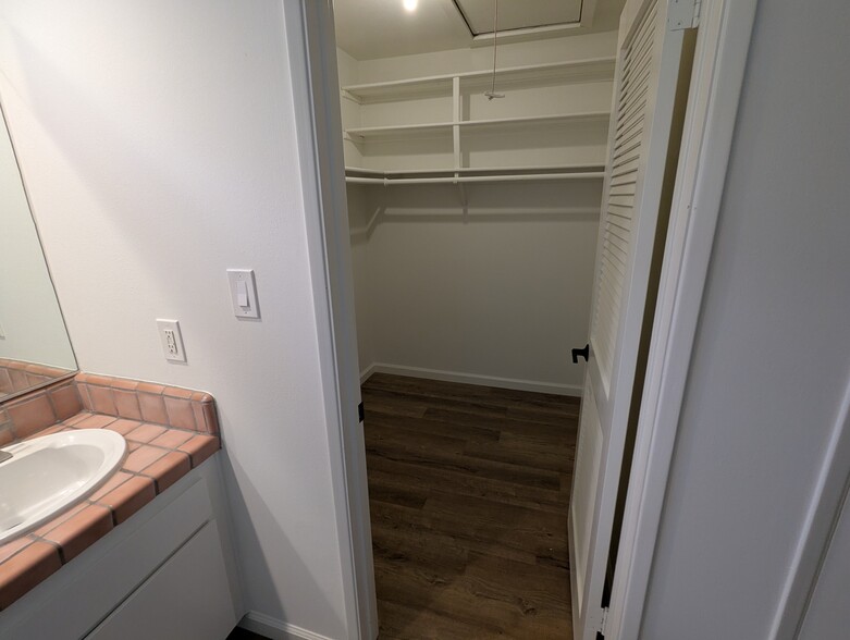 Huge walk-in closet off master bath with attic storage access - 1868 Kaweah Dr
