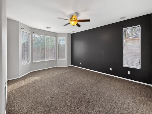Building Photo - Single-level 4 bed, 2 bath home with tandem 3-car garage and RV gate.