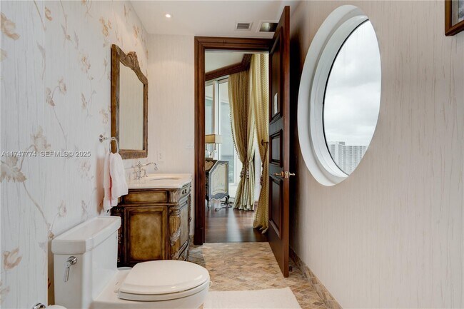 Building Photo - 16047 Collins Ave