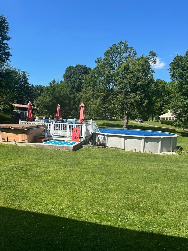 Building Photo - 5 Bedroom 2 1/2 Bath Home w/ Wrap Around P...