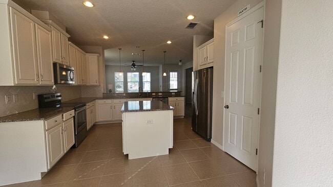 Building Photo - Immaculate Home in Guard Gated Community with Resort Style Amenities