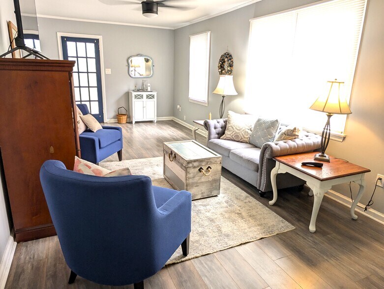 Bright and cozy living room with smart TV - 4107 Crane St