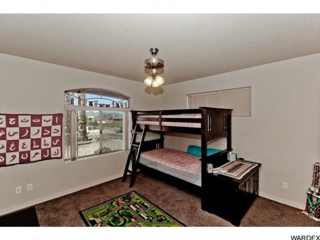 Building Photo - *REDUCED PRICE* Long Term - Unfurnished- Beautiful Golf Course Pool Home!!