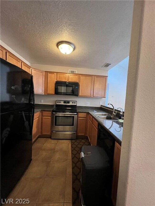 Building Photo - 9325 W Desert Inn Rd