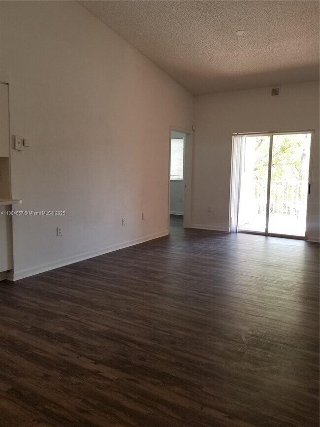 Building Photo - 3211 Sabal Palm Manor
