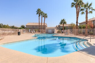 Building Photo - Two bedroom townhome with garage in gated ...