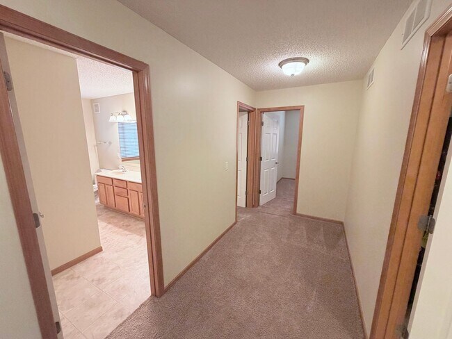 Building Photo - Spacious Bailey’s Arbor Townhome! 2BR + Bonus Living Room & Resort-Style Amenities!!