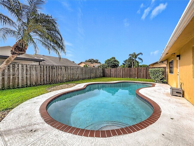 Building Photo - 8060 NW 51st Ct