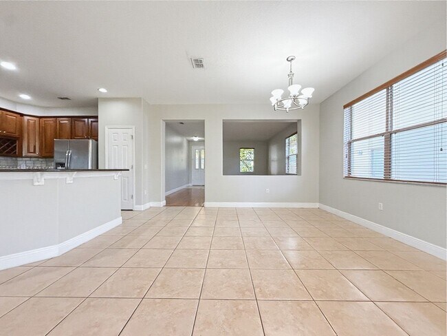 Building Photo - Waterfront 4 Bedroom Home in Eagle Creek Golf Community – Lake Nona