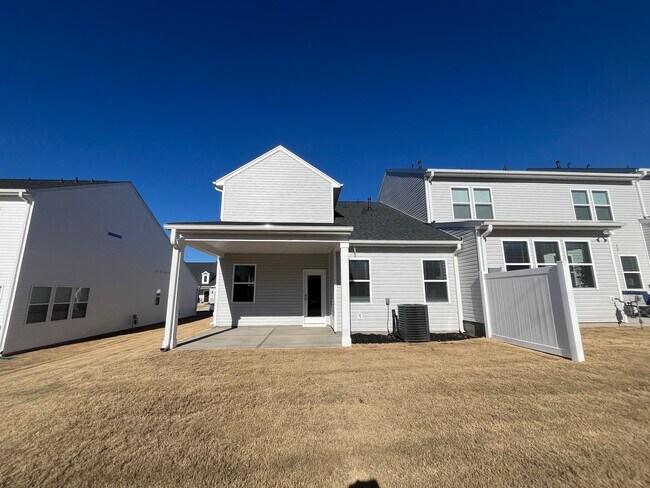 Building Photo - New 4/3 Townhome Available Now