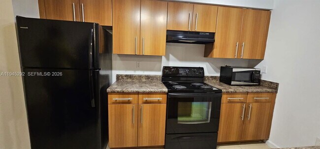 Building Photo - 5800 W Sample Rd