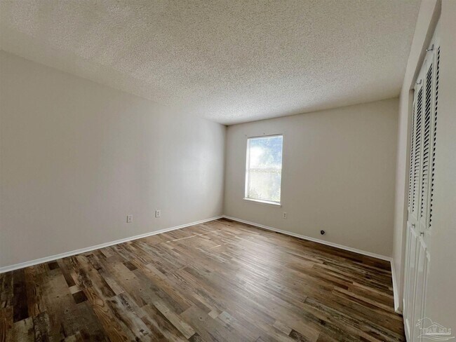 Building Photo - 6801 Tiki Ln