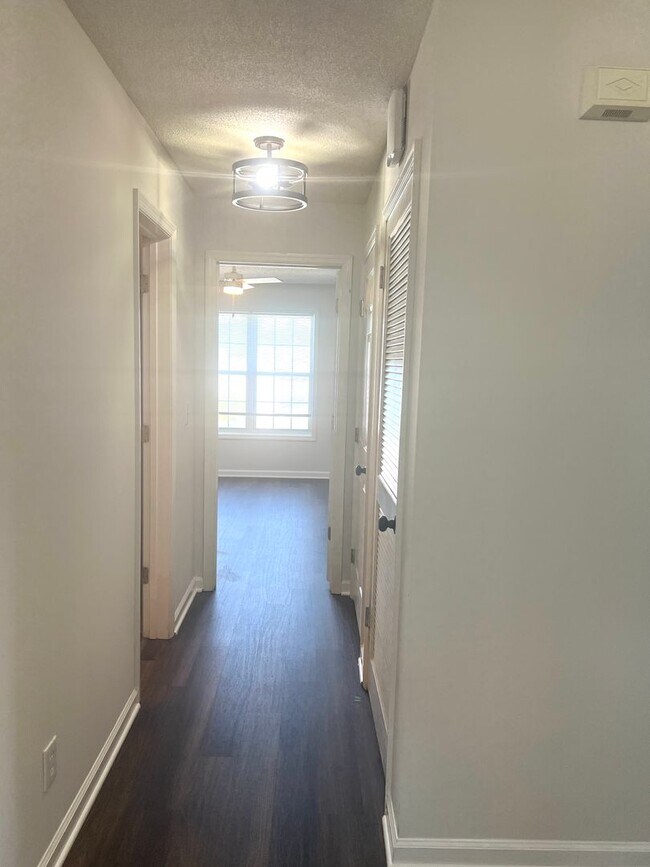 Building Photo - RENT SPECIAL! Freshly Painted! New Luxury ...