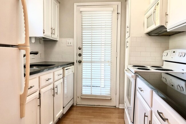 Building Photo - North Campus Condo Near UT – Spacious, Bright & Highly Convenient!