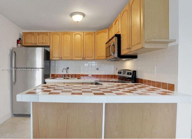 Building Photo - 4275 NW S Tamiami Canal Dr