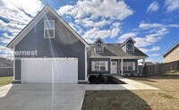Building Photo - Limited Time Special Offer / 3 Bed, 2 Bath Home with Garage / Pet-Friendly / Vouchers Accepted / ...