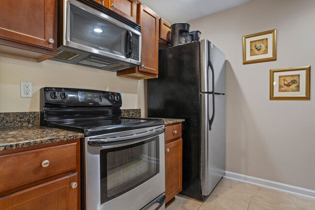 Building Photo - WATERFRONT LIVING! BEAUTIFULLY APPOINTED CONDO ON THE BAYOU IN OS SCHOOL DIST - FULLY FURNISHED