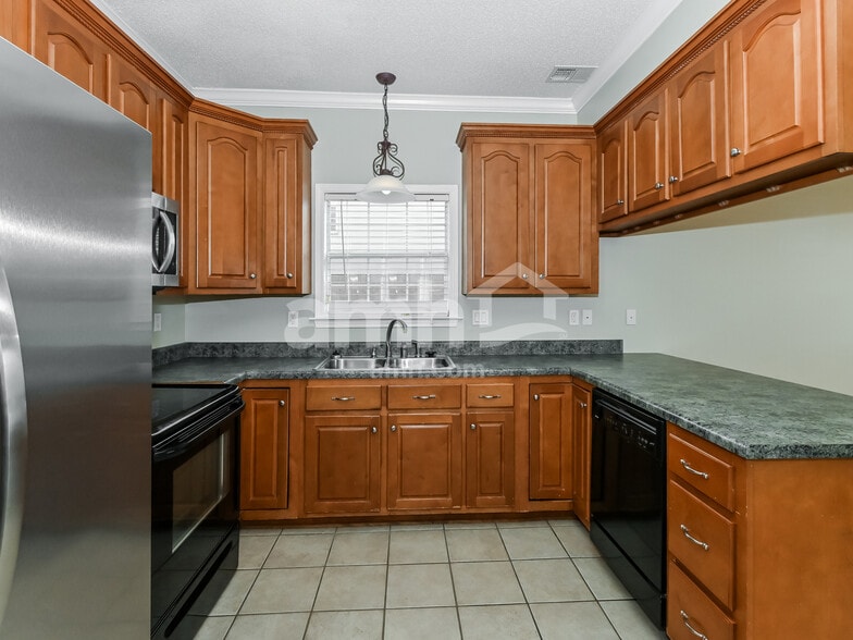 Building Photo - 6358 Braybourne Main