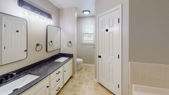 Building Photo - Charming 4-Bedroom Spacious Full-Brick Home with Modern Updates