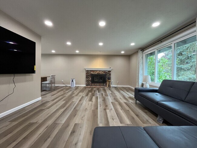 Building Photo - Three-Bedroom Home Near Nike Campus with Bonus Room, Large Deck & Two-Car Garage
