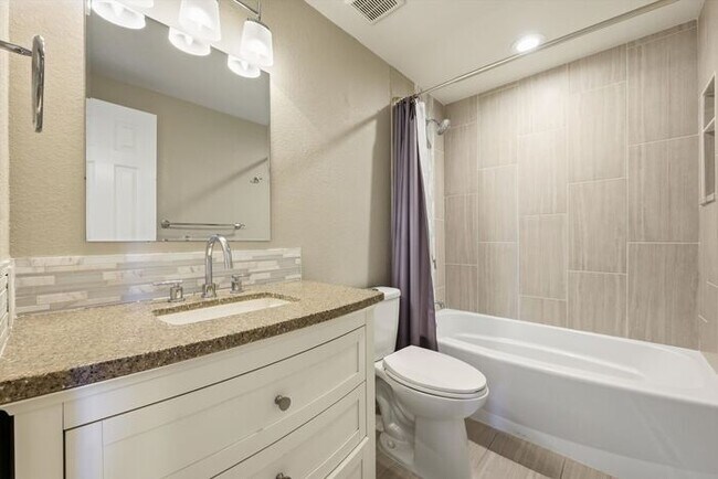 Building Photo - Spacious 4BR Home with Finished Basement, Private Yard & Community Amenities