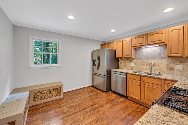 Building Photo - Freshly Updated Lassiter District Home with Finished Basement & Huge Backyard