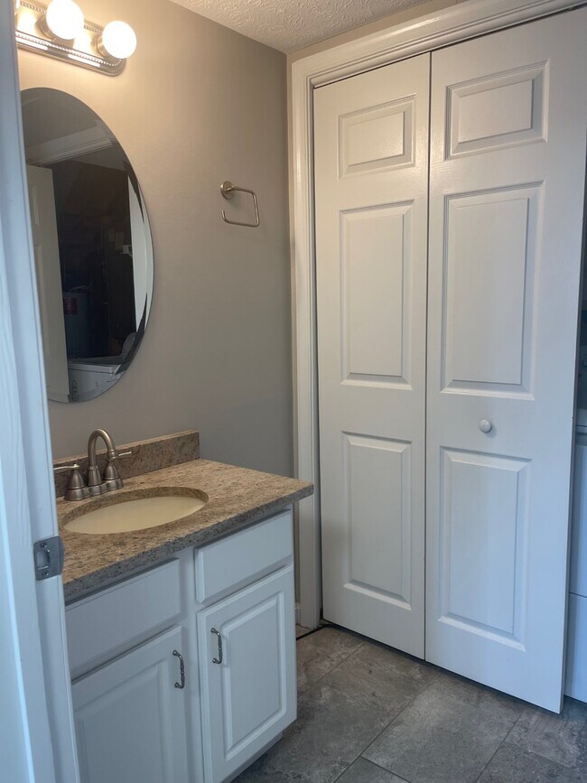 Powder Room - 7897 W End Dr