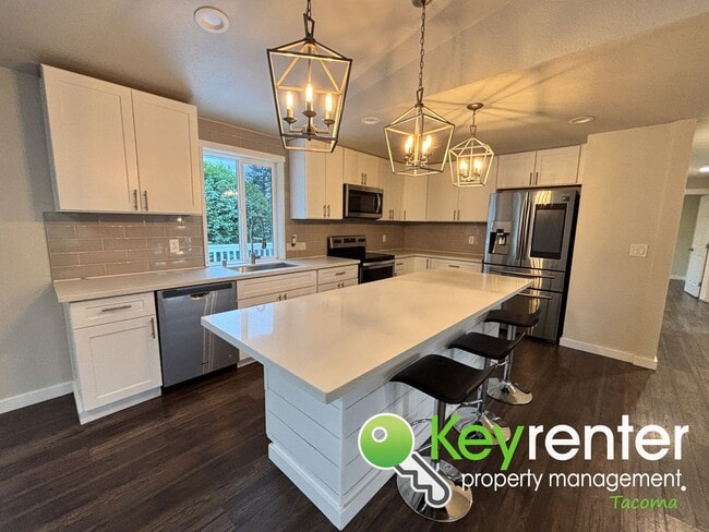 Building Photo - Shared Split level 3 Bed 2 Bath Upstairs Unit with Modern Upgrades Close to JBLM!