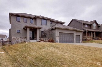 Building Photo - Spacious 4-Bedroom with Office, Drop Zone,...