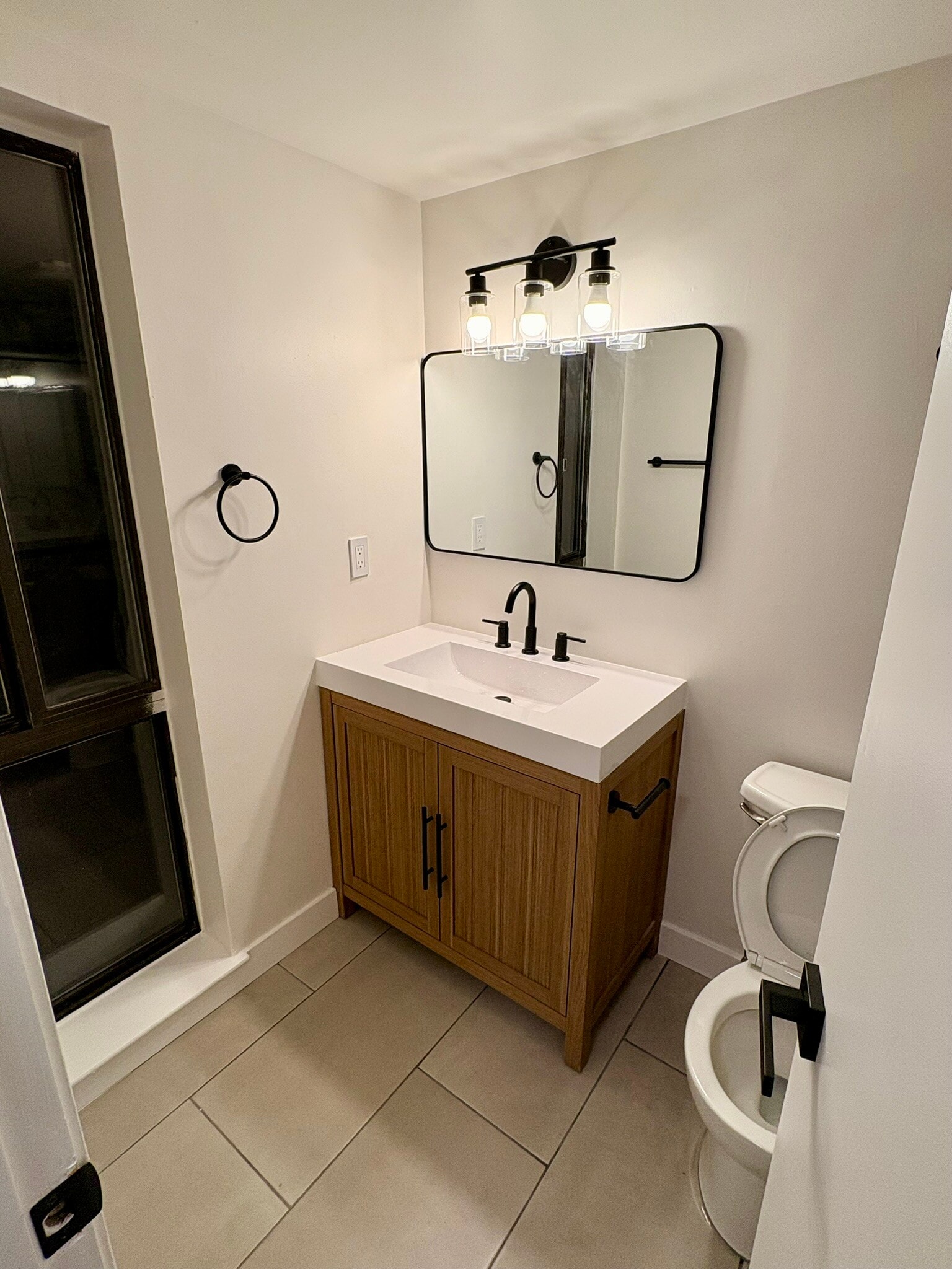 Master Bathroom, fully renovated. Has natural light - 11557 Rolling Green Ct